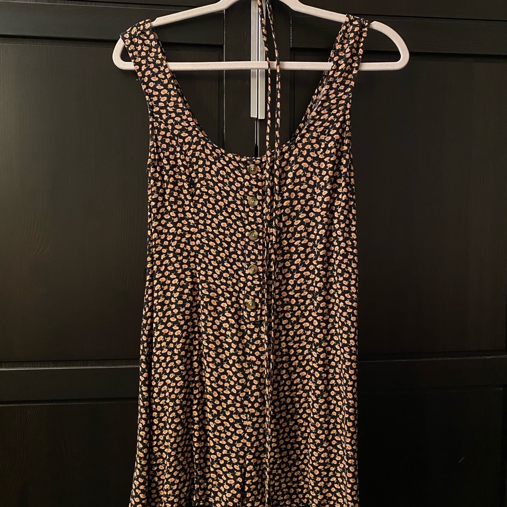 Black romper with beautiful tiny flowers from American Eagle size xs